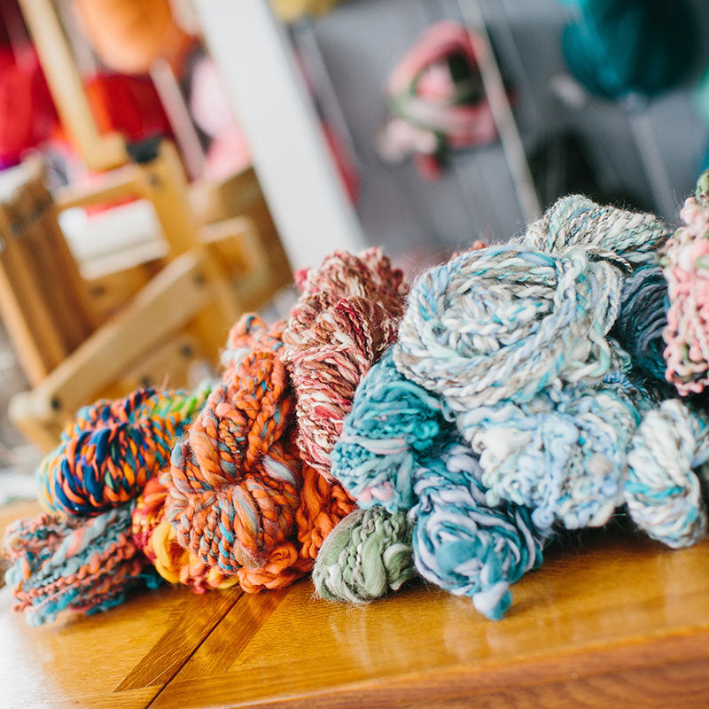 Art yarn pictured on a desk