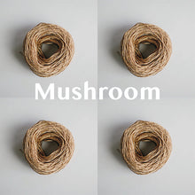 Load image into Gallery viewer, Four yarn cakes of 4-ply mercerised cotton yarn in mushroom packaged in a compostable plastic bag and an Oxford Weaving Studio sticker