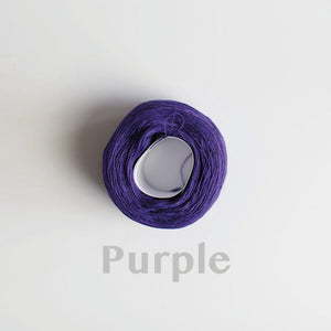 A 'Purple' colour yarn cake of 2/16s mercerised cotton yarn