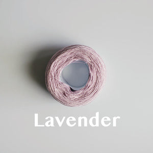 A 'Lavender' colour yarn cake of 2/16s mercerised cotton yarn