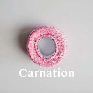 A 'Carnation' colour yarn cake of 2/16s mercerised cotton yarn