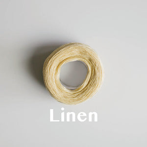 A 'Linen' colour yarn cake of 2/16s mercerised cotton yarn