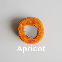 Load image into Gallery viewer, A &#39;Apricot&#39; colour yarn cake of 2/16s mercerised cotton yarn
