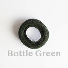 Load image into Gallery viewer, A &#39;Bottle Green&#39; colour yarn cake of 2/16s mercerised cotton yarn
