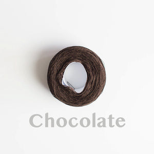 A 'Chocolate' colour yarn cake of 2/16s mercerised cotton yarn