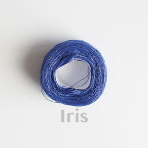 An 'Iris' colour yarn cake of 2/16s mercerised cotton yarn