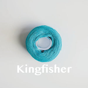 A 'Kingfisher' colour yarn cake of 2/16s mercerised cotton yarn