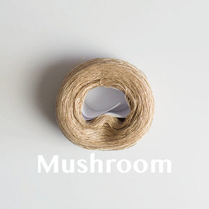 A 'Mushroom' colour yarn cake of 2/16s mercerised cotton yarn