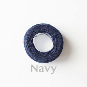A 'Navy' colour yarn cake of 2/16s mercerised cotton yarn
