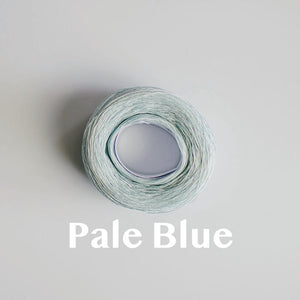 A 'Pale Blue' colour yarn cake of 2/16s mercerised cotton yarn