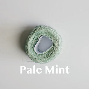 A 'Pale Mint' colour yarn cake of 2/16s mercerised cotton yarn