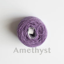Load image into Gallery viewer, An &#39;Amethyst&#39; colour yarn cake of 2/17s merino lambswool yarn
