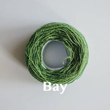 Load image into Gallery viewer, A &#39;Bay&#39; colour yarn cake of 2/17s merino lambswool yarn
