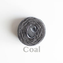 Load image into Gallery viewer, A &#39;Coal&#39; colour yarn cake of 2/17s merino lambswool yarn