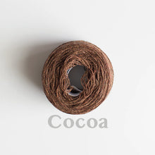 Load image into Gallery viewer, A &#39;Cocoa&#39; colour yarn cake of 2/17s merino lambswool yarn