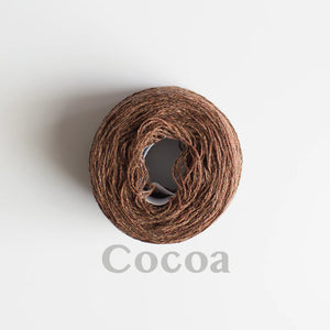 A 'Cocoa' colour yarn cake of 2/17s merino lambswool yarn