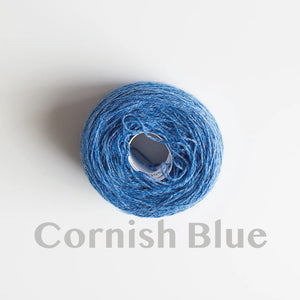 A 'Cornish Blue' colour yarn cake of 2/17s merino lambswool yarn