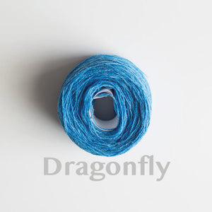 A 'Dragonfly' colour yarn cake of 2/17s merino lambswool yarn