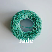 Load image into Gallery viewer, A &#39;Jade&#39; colour yarn cake of 2/17s merino lambswool yarn