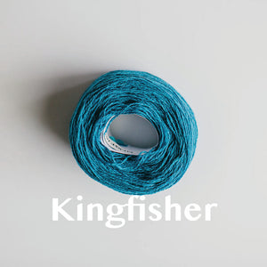 A 'Kingfisher' colour yarn cake of 2/17s merino lambswool yarn