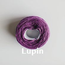 Load image into Gallery viewer, A &#39;Lupin&#39; colour yarn cake of 2/17s merino lambswool yarn