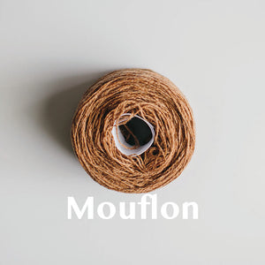 A 'Mouflon' colour yarn cake of 2/17s merino lambswool yarn
