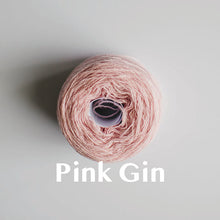 Load image into Gallery viewer, A &#39;Pink Gin&#39; colour yarn cake of 2/17s merino lambswool yarn
