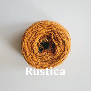 A 'Rustica' colour yarn cake of 2/17s merino lambswool yarn