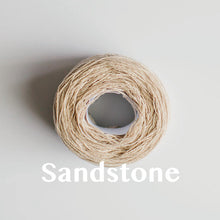 Load image into Gallery viewer, A &#39;Sandstone&#39; colour yarn cake of 2/17s merino lambswool yarn