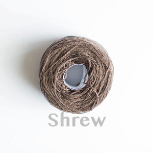 A 'Shrew' colour yarn cake of 2/17s merino lambswool yarn