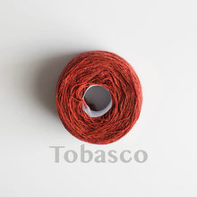 Load image into Gallery viewer, A &#39;Tobasco&#39; colour yarn cake of 2/17s merino lambswool yarn