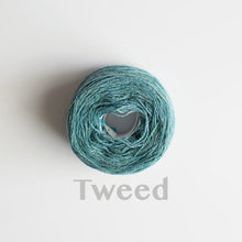 Load image into Gallery viewer, A &#39;Tweed&#39; colour yarn cake of 2/17s merino lambswool yarn