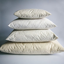 Load image into Gallery viewer, A pyramid stack of four different sized duck-filled cushion pads in cream