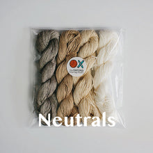 Load image into Gallery viewer, Four skeins of mercerised cotton yarn in neutral colours packaged in a compostable plastic bag and an Oxford Weaving Studio sticker