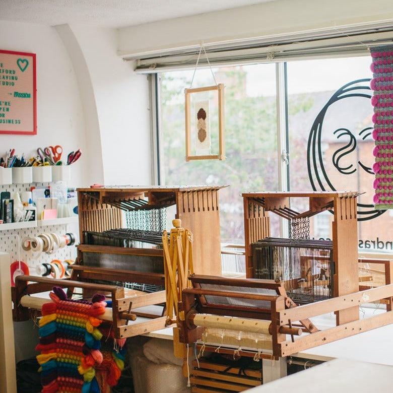 Harris table looms ready for students to learn to weave in a private weaving workshop at The Oxford Weaving Studio