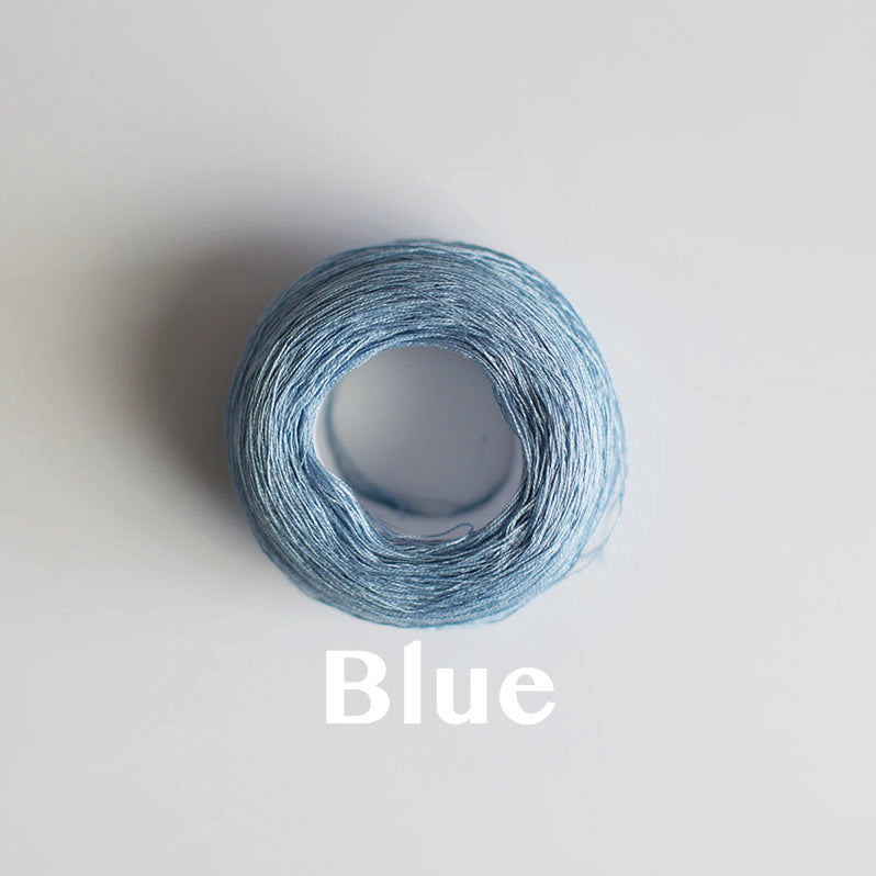 A 'Blue' colour yarn cake of 2/16s mercerised cotton yarn