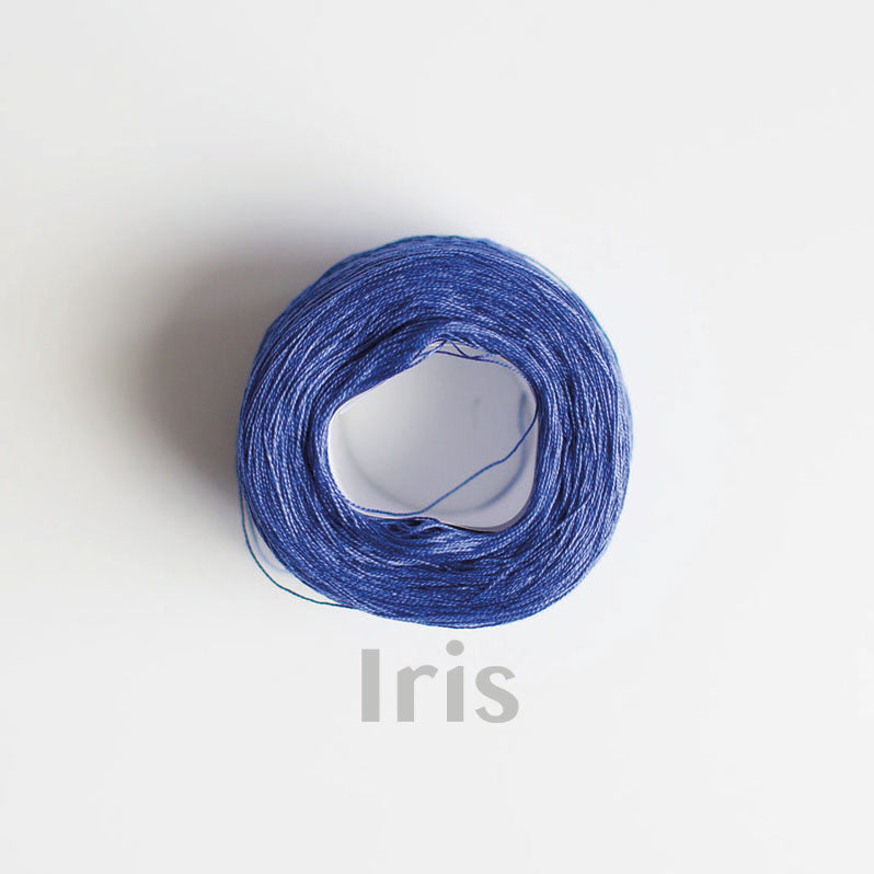 An 'Iris' colour yarn cake of 2/16s mercerised cotton yarn