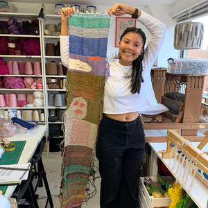 Proud student posing with her handwoven textiles at Tools used in a Private Weaving workshop at The Oxford Weaving Studio